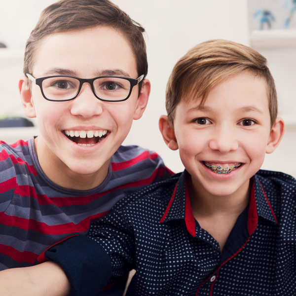 young brothers, one with braces